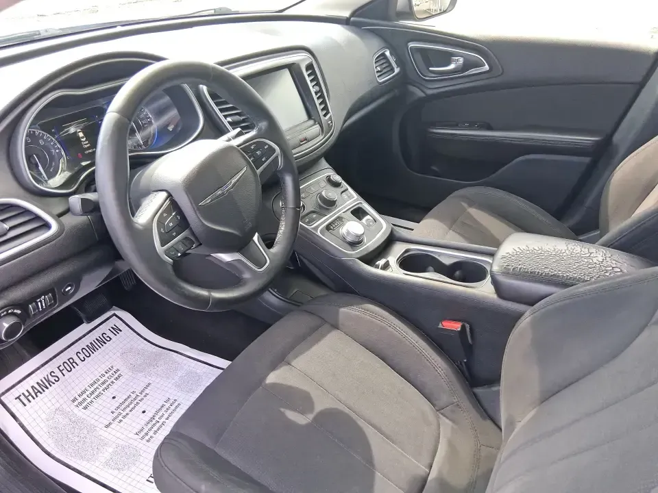 2015 Chrysler 200 Limited (1C3CCCAB5FN) with an 3.6L V-6 DOHC engine, 9-Speed Automatic transmission, located at 1230 East Main St, Xenia, OH, 45385, (937) 908-9800, 39.688026, -83.910172 - Picture an easy weekday commute from Xenia to Beavercreek or Dayton, then a comfortable Friday-night dinner run to downtown Yellow Springs-without giving up the refined feel you want in a daily driver. This 2015 Chrysler 200 Limited sedan is built for real life: smooth highway miles, school drop-off - Photo#9