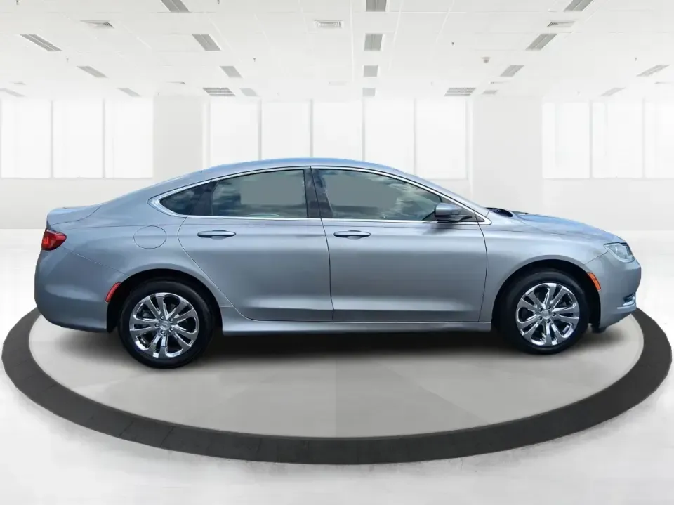 2015 Chrysler 200 Limited (1C3CCCAB5FN) with an 2.4L L4 DOHC 16V engine, 9-Speed Automatic transmission, located at 1099 N County Rd 25A, Troy, OH, 45373, (937) 908-9800, 40.057079, -84.212883 - Need a comfortable, efficient sedan for the daily commute from Troy to Dayton, quick errands along N County Rd 25A, or a weekend road trip down I-75? This 2015 Chrysler 200 Limited in Billet Silver Metallic Clearcoat fits real-life driving with a refined cabin, modern tech, and practical space for f- Photo#1