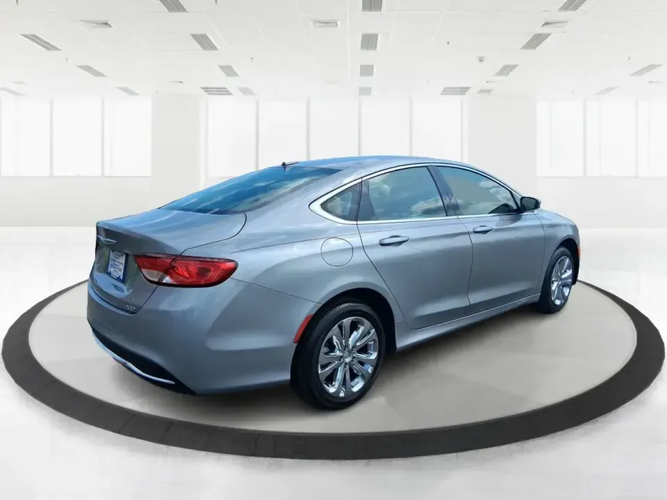 2015 Chrysler 200 Limited (1C3CCCAB5FN) with an 2.4L L4 DOHC 16V engine, 9-Speed Automatic transmission, located at 1099 N County Rd 25A, Troy, OH, 45373, (937) 908-9800, 40.057079, -84.212883 - Need a comfortable, efficient sedan for the daily commute from Troy to Dayton, quick errands along N County Rd 25A, or a weekend road trip down I-75? This 2015 Chrysler 200 Limited in Billet Silver Metallic Clearcoat fits real-life driving with a refined cabin, modern tech, and practical space for f- Photo#2