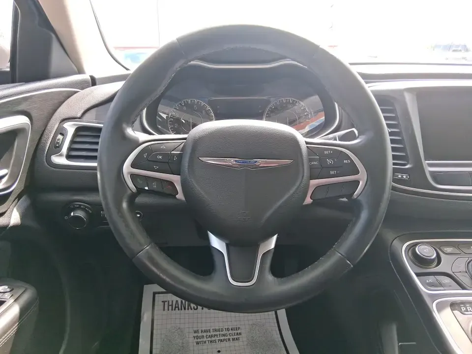 2015 Chrysler 200 Limited (1C3CCCAB5FN) with an 2.4L L4 DOHC 16V engine, 9-Speed Automatic transmission, located at 1099 N County Rd 25A, Troy, OH, 45373, (937) 908-9800, 40.057079, -84.212883 - Need a comfortable, efficient sedan for the daily commute from Troy to Dayton, quick errands along N County Rd 25A, or a weekend road trip down I-75? This 2015 Chrysler 200 Limited in Billet Silver Metallic Clearcoat fits real-life driving with a refined cabin, modern tech, and practical space for f- Photo#16