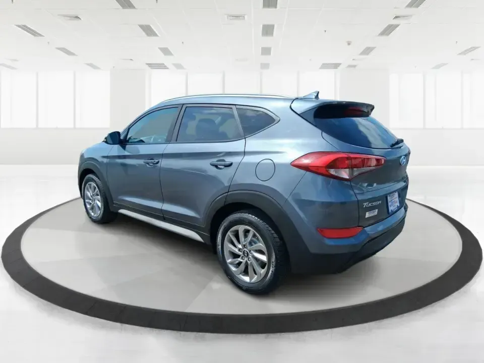 2018 Hyundai Tucson SEL Plus (KM8J33A4XJU) with an Nu 2L I-4 gasoline direct injection engine, 6A transmission, located at 1230 East Main St, Xenia, OH, 45385, (937) 908-9800, 39.688026, -83.910172 - Need a do-it-all SUV that fits real life in Greene County-school runs, long commutes to Dayton, and weekend getaways to John Bryan State Park-without sacrificing comfort or confidence? This 2018 Hyundai Tucson SEL Plus in Coliseum Gray is built for drivers who want practical space, modern tech, and - Photo#4
