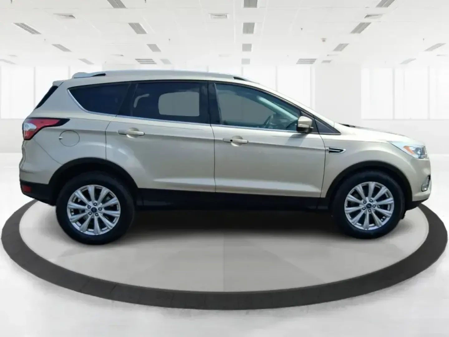 2017 Ford Escape Titanium (1FMCU9JD2HU) with an 1.5L L4 DOHC 16V engine, 6A transmission, located at 1230 East Main St, Xenia, OH, 45385, (937) 908-9800, 39.688026, -83.910172 - Whether you're a busy commuter running up and down US-35, a growing family juggling school drop-offs, or a weekend explorer heading out toward John Bryan State Park, this 2017 Ford Escape Titanium is the kind of compact SUV that fits real life in Xenia. With confident AWD capability, upscale comfort - Photo#1