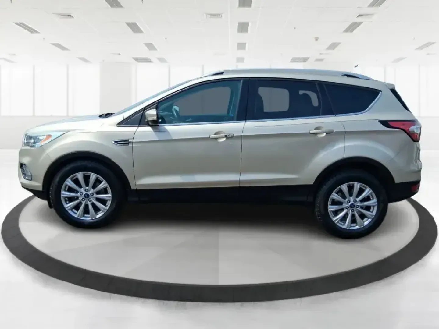 2017 Ford Escape Titanium (1FMCU9JD2HU) with an 1.5L L4 DOHC 16V engine, 6A transmission, located at 1230 East Main St, Xenia, OH, 45385, (937) 908-9800, 39.688026, -83.910172 - Whether you're a busy commuter running up and down US-35, a growing family juggling school drop-offs, or a weekend explorer heading out toward John Bryan State Park, this 2017 Ford Escape Titanium is the kind of compact SUV that fits real life in Xenia. With confident AWD capability, upscale comfort - Photo#5