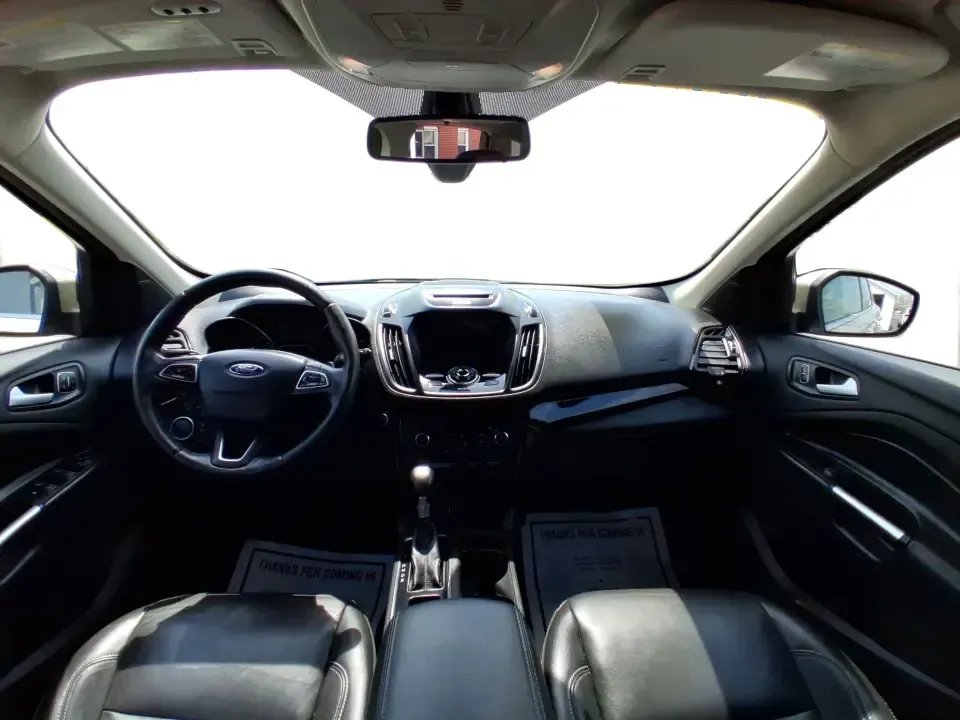 2017 Ford Escape Titanium (1FMCU9JD2HU) with an 1.5L L4 DOHC 16V engine, 6A transmission, located at 1230 East Main St, Xenia, OH, 45385, (937) 908-9800, 39.688026, -83.910172 - Whether you're a busy commuter running up and down US-35, a growing family juggling school drop-offs, or a weekend explorer heading out toward John Bryan State Park, this 2017 Ford Escape Titanium is the kind of compact SUV that fits real life in Xenia. With confident AWD capability, upscale comfort - Photo#21