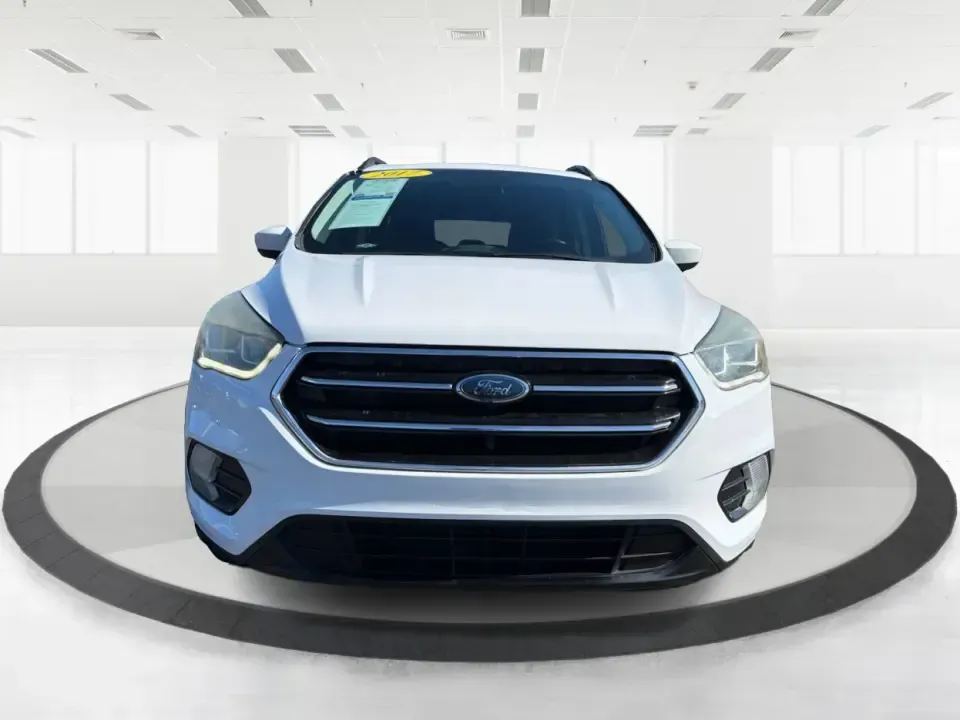 2017 Ford Escape SE (1FMCU0GD2HU) with an 1.5L L4 DOHC 16V engine, 6A transmission, located at 8750 N County Rd 25A, Piqua, OH, 45356, (937) 908-9800, 40.164391, -84.232513 - Picture a weekday that starts with a smooth commute up N County Rd 25A, turns into easy school drop-offs, and ends with a weekend escape to Indian Lake or a quick run down I75 for shopping and dinner-this 2017 Ford Escape SE is built for real life in and around Piqua, Ohio. Finished in standout Whit - Photo#7