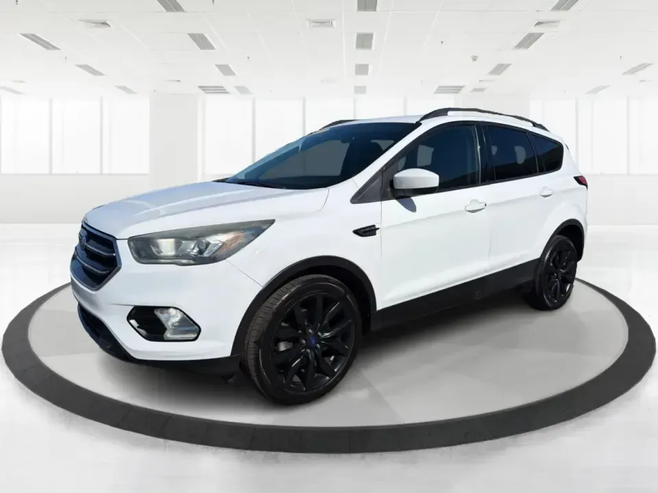 2017 Ford Escape SE (1FMCU0GD2HU) with an 1.5L L4 DOHC 16V engine, 6A transmission, located at 8750 N County Rd 25A, Piqua, OH, 45356, (937) 908-9800, 40.164391, -84.232513 - Picture a weekday that starts with a smooth commute up N County Rd 25A, turns into easy school drop-offs, and ends with a weekend escape to Indian Lake or a quick run down I75 for shopping and dinner-this 2017 Ford Escape SE is built for real life in and around Piqua, Ohio. Finished in standout Whit - Photo#8