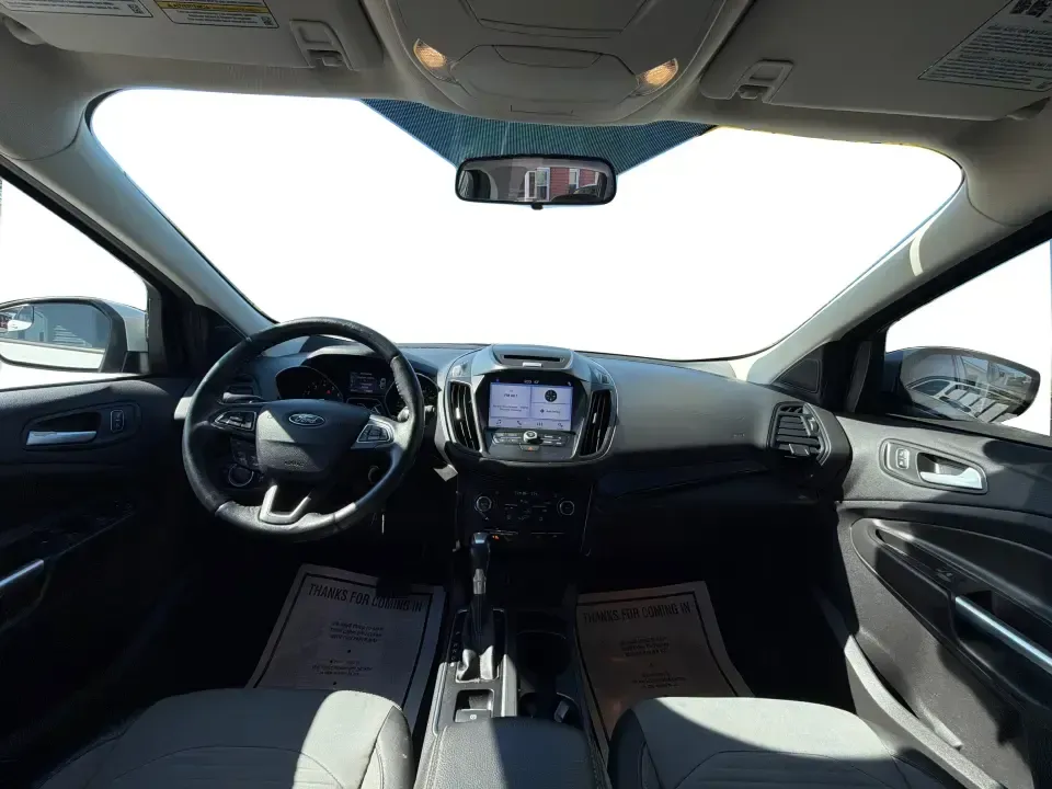 2017 Ford Escape SE (1FMCU0GD2HU) with an 1.5L L4 DOHC 16V engine, 6A transmission, located at 8750 N County Rd 25A, Piqua, OH, 45356, (937) 908-9800, 40.164391, -84.232513 - Picture a weekday that starts with a smooth commute up N County Rd 25A, turns into easy school drop-offs, and ends with a weekend escape to Indian Lake or a quick run down I75 for shopping and dinner-this 2017 Ford Escape SE is built for real life in and around Piqua, Ohio. Finished in standout Whit - Photo#21