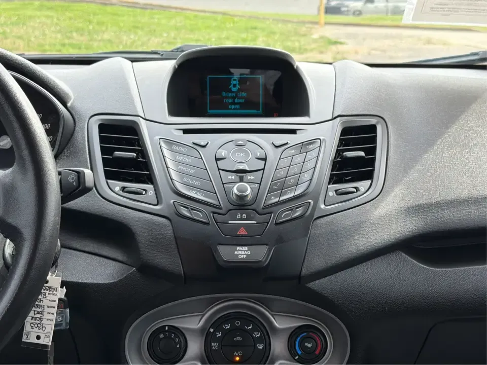 2016 Ford Fiesta SE (3FADP4EJ8GM) with an 1.6L L4 DOHC 16V engine, located at 8750 N County Rd 25A, Piqua, OH, 45356, (937) 908-9800, 40.164391, -84.232513 - Need a smart, easy-to-park hatchback that makes daily life simpler-whether you're commuting up I-75, running errands around downtown Piqua, or packing up for a weekend at Lock 9 Park? This 2016 Ford Fiesta SE Hatchback in Shadow Black delivers big practicality in a small, budget-friendly footprint, - Photo#13