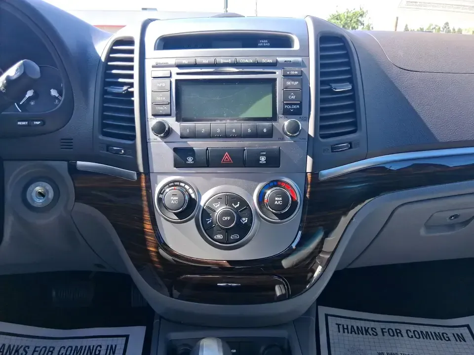 2012 Hyundai Santa Fe GLS (5XYZGDABXCG) with an 2.4L I-4 DOHC engine, 6-Speed Automatic transmission, located at 8750 N County Rd 25A, Piqua, OH, 45356, (937) 908-9800, 40.164391, -84.232513 - Pack up the kids, load the groceries, and head out for a weekend escape-this 2012 Hyundai Santa Fe GLS is the kind of SUV that fits real life in West Central Ohio. Whether you're commuting up N County Rd 25A toward Troy, running errands near downtown Piqua, or planning a road trip out past the Great - Photo#13