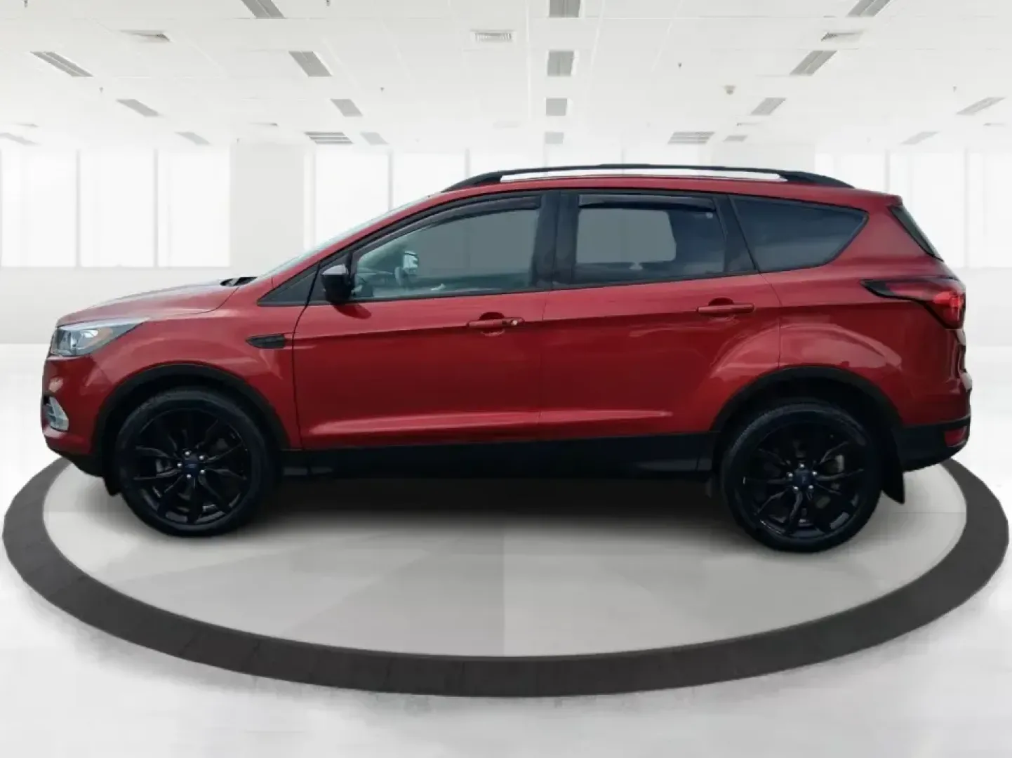2019 Ford Escape SE 4WD (1FMCU9GD8KU) with an 1.5L L4 DOHC 16V engine, 6A transmission, located at 8750 N County Rd 25A, Piqua, OH, 45356, (937) 908-9800, 40.164391, -84.232513 - Picture a weekend that starts with a quick commute through Miami County and ends with a spontaneous getaway-your SUV packed, playlists ready, and the confidence to handle Ohio's changing weather. This 2019 Ford Escape SE in eye-catching Ruby Red Metallic Tinted Clearcoat is built for real life in Pi- Photo#5
