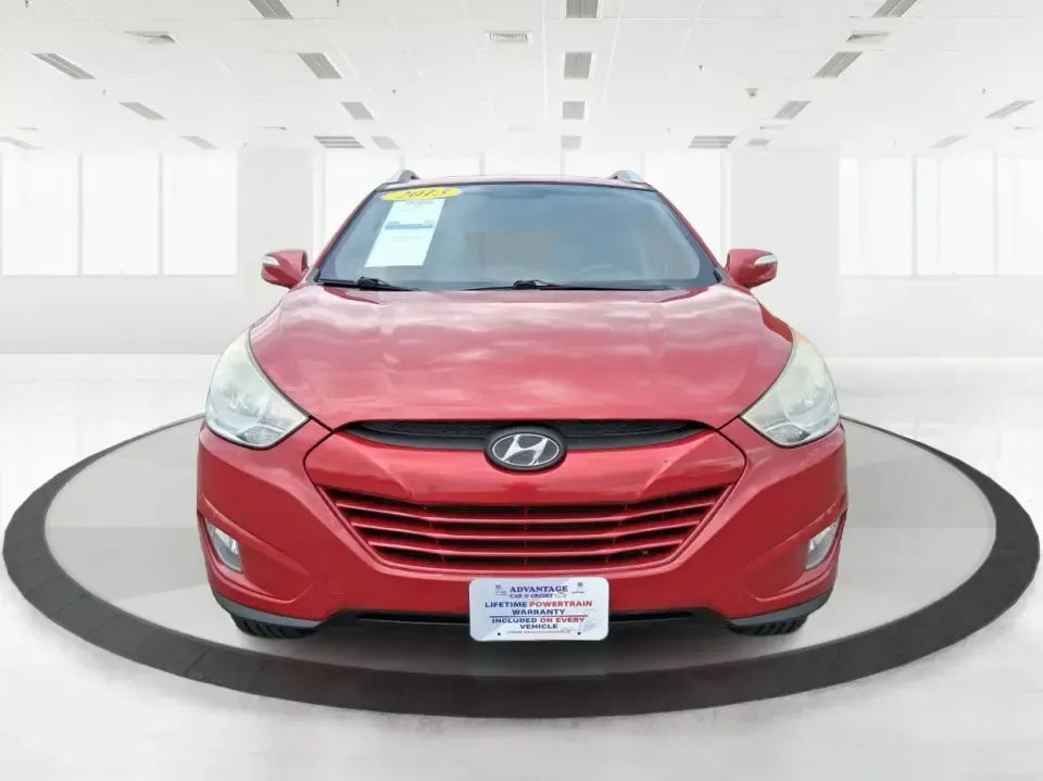 2013 Hyundai Tucson GLS (KM8JUCAC7DU) with an Theta II 2.4L I-4 DOHC engine, 6-Speed Automatic transmission, located at 1951 S Dayton Lakeview Rd., New Carlisle, OH, 45344, (937) 908-9800, 39.890999, -84.050255 - Need a dependable SUV that can handle Ohio weather, school drop-offs, and weekend getaways without stretching your budget? This 2013 Hyundai Tucson GLS in eye-catching Garnet Red is built for real life-comfortable for daily commuting, confident on slick winter roads, and practical for everything fro - Photo#7