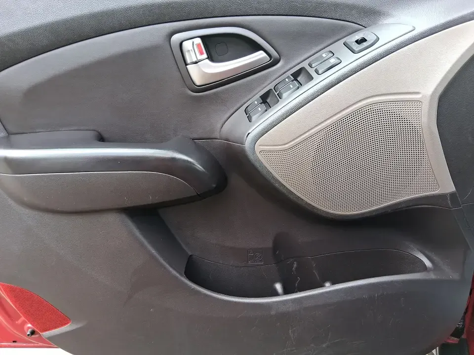 2013 Hyundai Tucson GLS (KM8JUCAC7DU) with an Theta II 2.4L I-4 DOHC engine, 6-Speed Automatic transmission, located at 8750 N County Rd 25A, Piqua, OH, 45356, (937) 908-9800, 40.164391, -84.232513 - Need a dependable SUV that can handle Ohio weather, school drop-offs, and weekend getaways without stretching your budget? This 2013 Hyundai Tucson GLS in eye-catching Garnet Red is built for real life-comfortable for daily commuting, confident on slick winter roads, and practical for everything fro - Photo#17