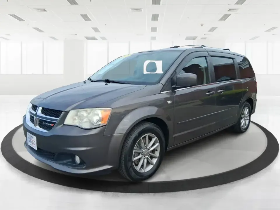 2014 Dodge Grand Caravan SXT 30th Anniversary (2C4RDGCGXER) with an 3.6L V-6 DOHC engine, 6-Speed Automatic transmission, located at 1951 S Dayton Lakeview Rd., New Carlisle, OH, 45344, (937) 908-9800, 39.890999, -84.050255 - Load up the kids, the coolers, and the weekend plans-this 2014 Dodge Grand Caravan SXT 30th Anniversary is built for real life in Ohio, whether you're handling school drop-offs, commuting down I70, or taking a road trip to the National Museum of the U.S. Air Force in nearby Dayton. With three rows a - Photo#8