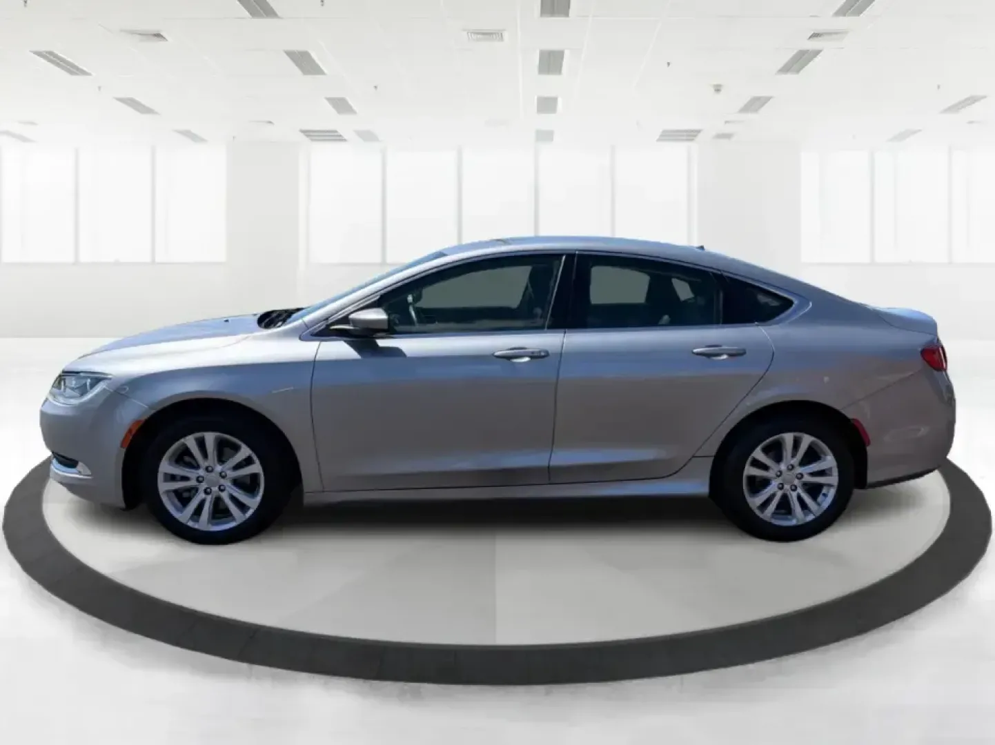 2016 Chrysler 200 Limited Platinum (1C3CCCABXGN) with an 2.4L L4 DOHC 16V engine, 9A transmission, located at 1184 Kauffman Ave, Fairborn, OH, 45324, (937) 908-9800, 39.807072, -84.030914 - Picture your next weekday commute down I675 or a smooth evening drive past Wright State University-quiet cabin, premium touches, and the kind of comfort that makes errands, school drop-offs, and date nights feel effortless. This 2016 Chrysler 200 Limited Platinum in Billet Silver Metallic Clearcoat - Photo#5