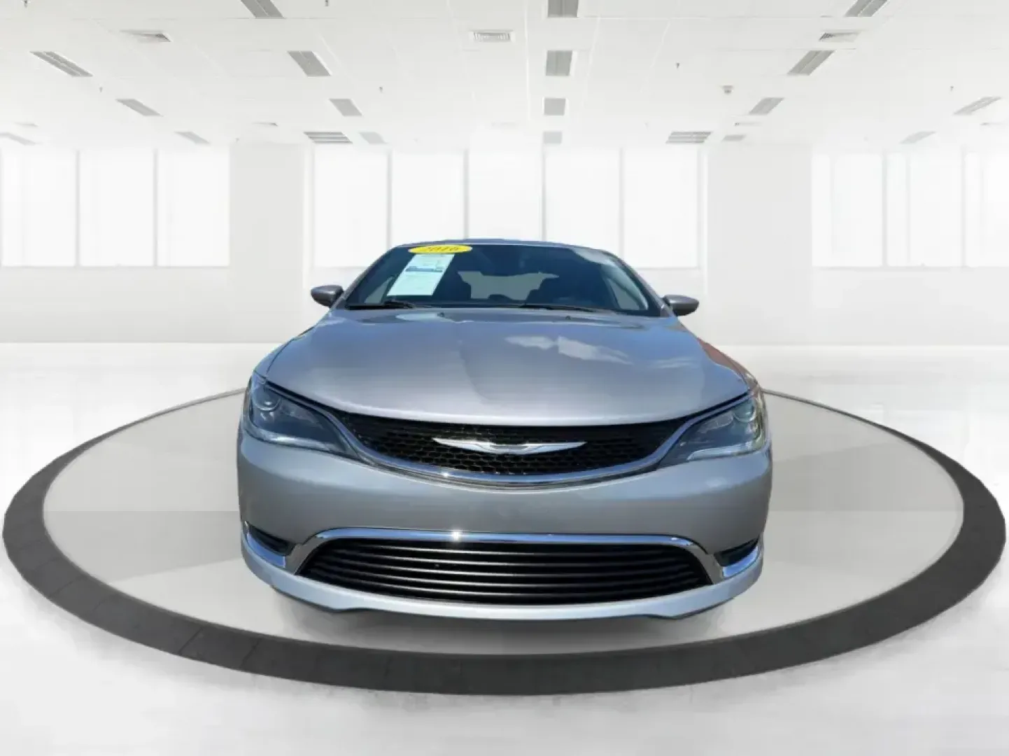2016 Chrysler 200 Limited Platinum (1C3CCCABXGN) with an 2.4L L4 DOHC 16V engine, 9A transmission, located at 1184 Kauffman Ave, Fairborn, OH, 45324, (937) 908-9800, 39.807072, -84.030914 - Picture your next weekday commute down I675 or a smooth evening drive past Wright State University-quiet cabin, premium touches, and the kind of comfort that makes errands, school drop-offs, and date nights feel effortless. This 2016 Chrysler 200 Limited Platinum in Billet Silver Metallic Clearcoat - Photo#7