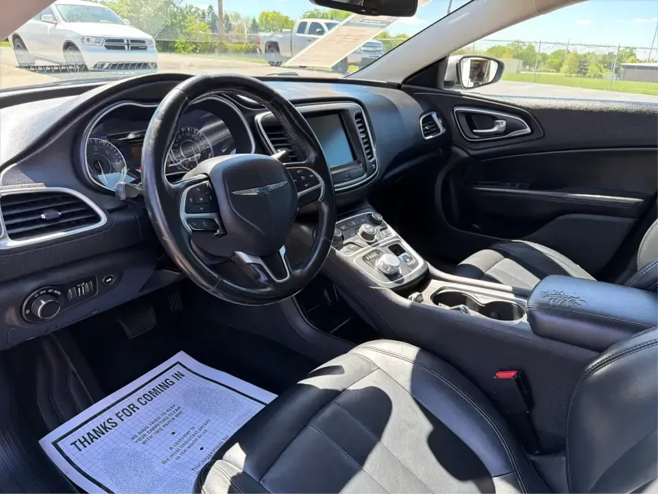 2016 Chrysler 200 Limited Platinum (1C3CCCABXGN) with an 2.4L L4 DOHC 16V engine, 9A transmission, located at 1184 Kauffman Ave, Fairborn, OH, 45324, (937) 908-9800, 39.807072, -84.030914 - Picture your next weekday commute down I675 or a smooth evening drive past Wright State University-quiet cabin, premium touches, and the kind of comfort that makes errands, school drop-offs, and date nights feel effortless. This 2016 Chrysler 200 Limited Platinum in Billet Silver Metallic Clearcoat - Photo#9