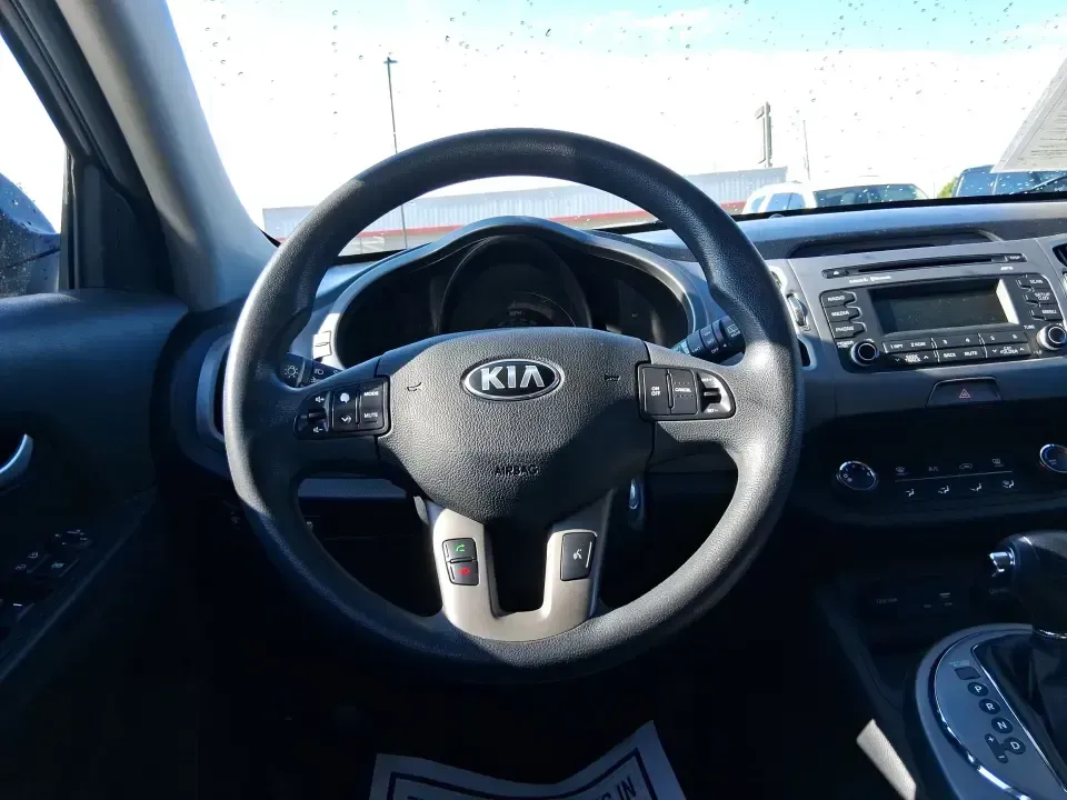 2016 Kia Sportage LX (KNDPBCAC7G7) with an Theta II 2.4L I-4 gasoline direct injection engine, 6-Speed Automatic transmission, located at 880 E. National Road, Vandalia, OH, 45377, (937) 908-9800, 39.891918, -84.183594 - Need a crossover that can handle Ohio's four seasons, school runs, and weekend getaways without draining your budget? This 2016 Kia Sportage LX is built for real life in Vandalia-whether you're commuting down I75, running errands along National Road, or packing up for a day at the Dayton Aviation He - Photo#16