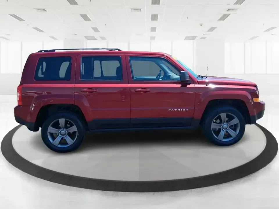 2015 Jeep Patriot High Altitude Edition (1C4NJRFB0FD) with an 2.4L I-4 DOHC engine, located at 1099 N County Rd 25A, Troy, OH, 45373, (937) 908-9800, 40.057079, -84.212883 - Picture your next Ohio weekend: loading up for a road trip to Hocking Hills, heading to a kids' tournament at Duke Park, or navigating winter backroads outside Troy with confidence. This **2015 Jeep Patriot High Altitude Edition** is the kind of SUV that fits real life-practical for daily errands, c - Photo#1