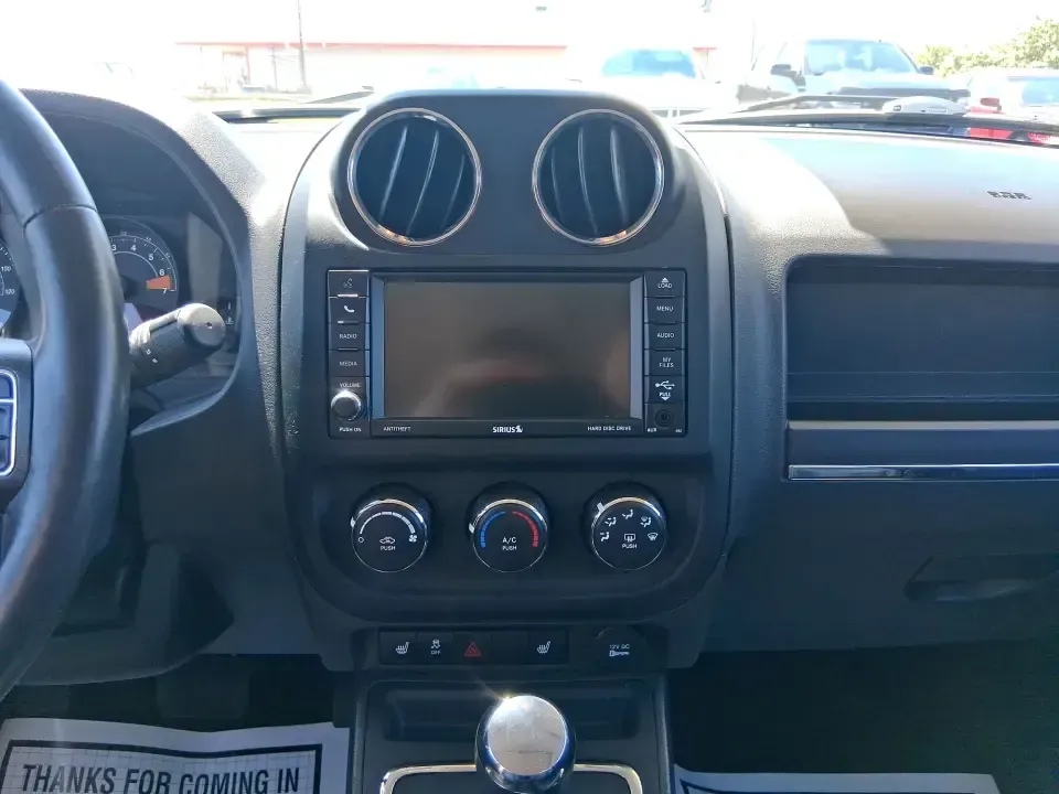 2015 Jeep Patriot High Altitude Edition (1C4NJRFB0FD) with an 2.4L I-4 DOHC engine, located at 1099 N County Rd 25A, Troy, OH, 45373, (937) 908-9800, 40.057079, -84.212883 - Picture your next Ohio weekend: loading up for a road trip to Hocking Hills, heading to a kids' tournament at Duke Park, or navigating winter backroads outside Troy with confidence. This **2015 Jeep Patriot High Altitude Edition** is the kind of SUV that fits real life-practical for daily errands, c - Photo#13