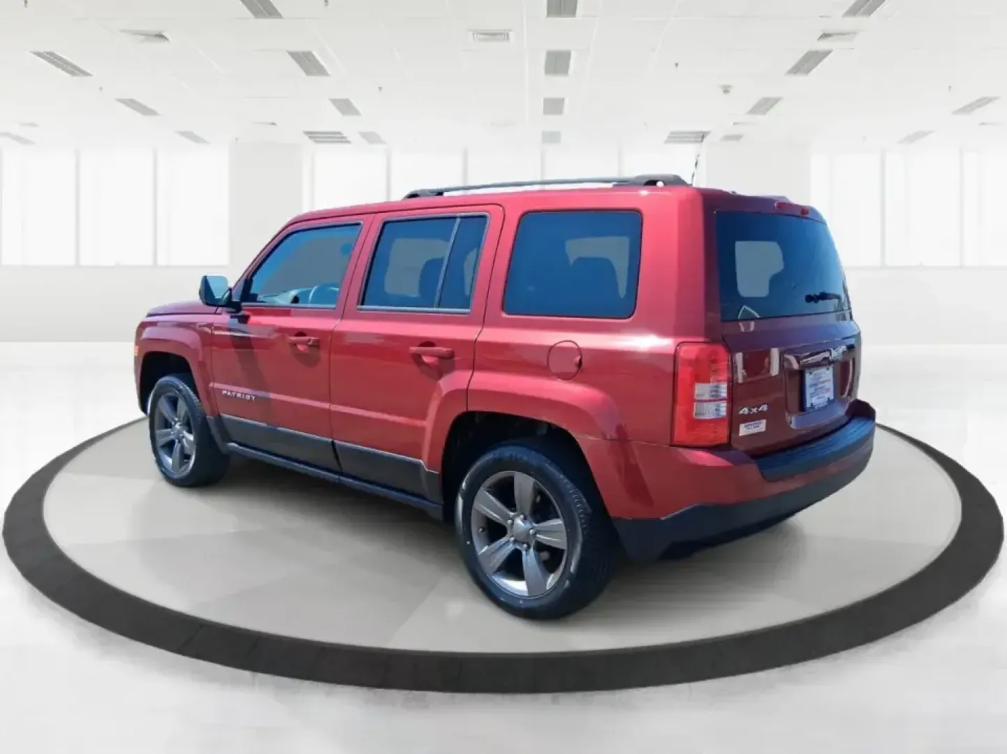 2015 Jeep Patriot Latitude 4WD (1C4NJRFB0FD) with an 2.4L L4 DOHC 16V engine, located at 401 Woodman Dr, Riverside, OH, 45431, (937) 908-9800, 39.760899, -84.123421 - Weekday commuting on I675, weekend runs to Eastwood MetroPark, or a packed-up family road trip toward Yellow Springs-this Deep Cherry Red Crystal Pearlcoat 2015 Jeep Patriot Latitude 4WD is built for the kind of life that doesn't stay parked. With SUV versatility, confident four-wheel drive, and sea- Photo#4