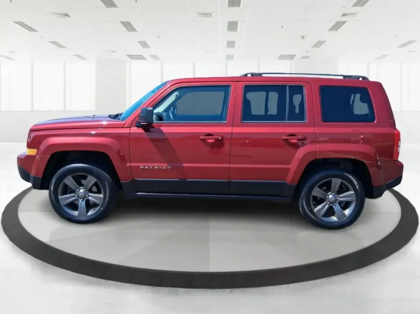 2015 Jeep Patriot Latitude 4WD (1C4NJRFB0FD) with an 2.4L L4 DOHC 16V engine, located at 401 Woodman Dr, Riverside, OH, 45431, (937) 908-9800, 39.760899, -84.123421 - Weekday commuting on I675, weekend runs to Eastwood MetroPark, or a packed-up family road trip toward Yellow Springs-this Deep Cherry Red Crystal Pearlcoat 2015 Jeep Patriot Latitude 4WD is built for the kind of life that doesn't stay parked. With SUV versatility, confident four-wheel drive, and sea- Photo#5