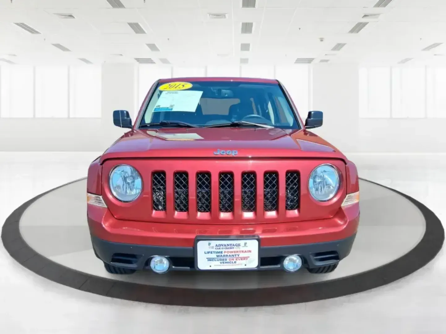2015 Jeep Patriot Latitude 4WD (1C4NJRFB0FD) with an 2.4L L4 DOHC 16V engine, located at 401 Woodman Dr, Riverside, OH, 45431, (937) 908-9800, 39.760899, -84.123421 - Weekday commuting on I675, weekend runs to Eastwood MetroPark, or a packed-up family road trip toward Yellow Springs-this Deep Cherry Red Crystal Pearlcoat 2015 Jeep Patriot Latitude 4WD is built for the kind of life that doesn't stay parked. With SUV versatility, confident four-wheel drive, and sea- Photo#7