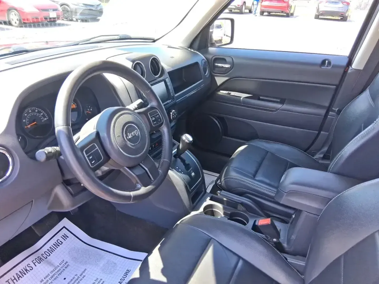 2015 Jeep Patriot Latitude 4WD (1C4NJRFB0FD) with an 2.4L L4 DOHC 16V engine, located at 401 Woodman Dr, Riverside, OH, 45431, (937) 908-9800, 39.760899, -84.123421 - Weekday commuting on I675, weekend runs to Eastwood MetroPark, or a packed-up family road trip toward Yellow Springs-this Deep Cherry Red Crystal Pearlcoat 2015 Jeep Patriot Latitude 4WD is built for the kind of life that doesn't stay parked. With SUV versatility, confident four-wheel drive, and sea- Photo#9