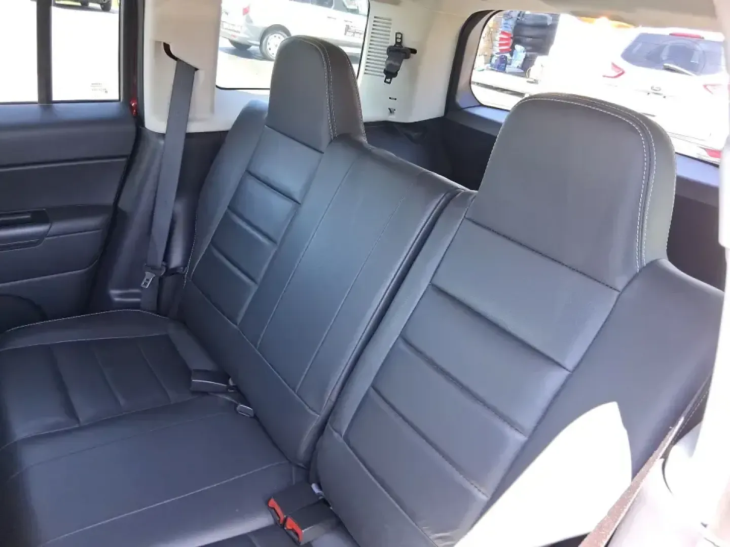 2015 Jeep Patriot Latitude 4WD (1C4NJRFB0FD) with an 2.4L L4 DOHC 16V engine, located at 401 Woodman Dr, Riverside, OH, 45431, (937) 908-9800, 39.760899, -84.123421 - Weekday commuting on I675, weekend runs to Eastwood MetroPark, or a packed-up family road trip toward Yellow Springs-this Deep Cherry Red Crystal Pearlcoat 2015 Jeep Patriot Latitude 4WD is built for the kind of life that doesn't stay parked. With SUV versatility, confident four-wheel drive, and sea- Photo#10
