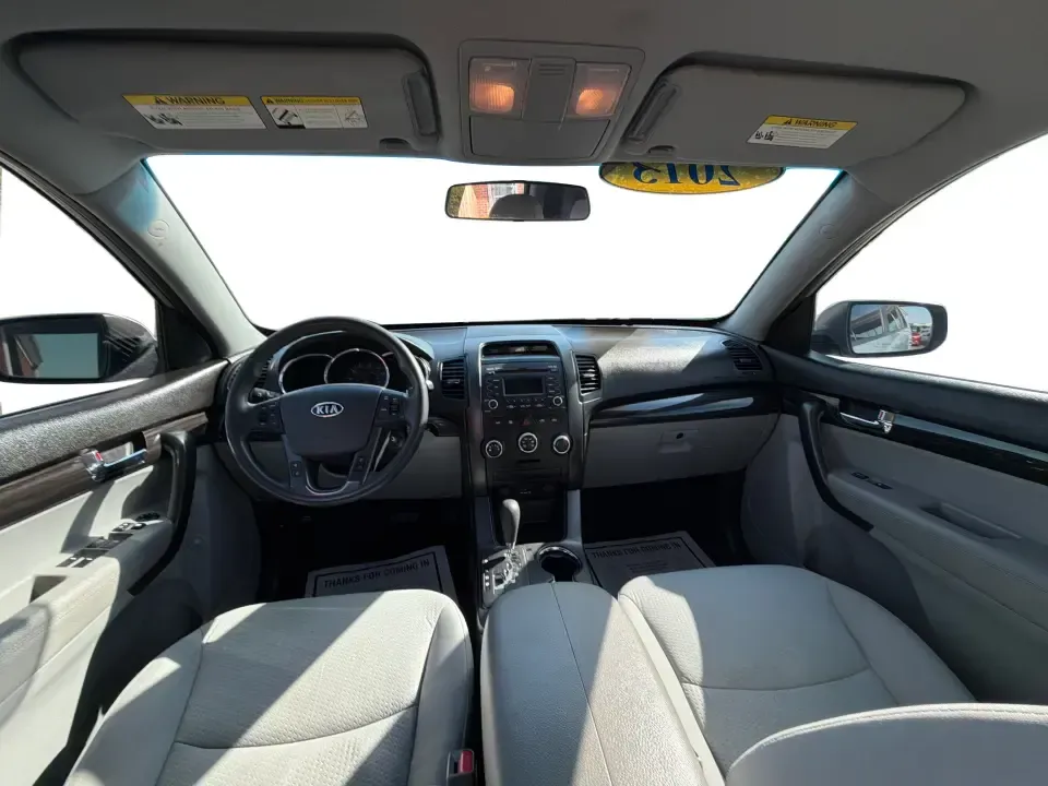 2013 Kia Sorento LX (5XYKT3A12DG) with an 2.4L I-4 DOHC engine, 6-Speed Automatic transmission, located at 8750 N County Rd 25A, Piqua, OH, 45356, (937) 908-9800, 40.164391, -84.232513 - Need one SUV that can handle the school run, a long commute up I75, and a weekend getaway to Indian Lake without blowing your budget? This 2013 Kia Sorento LX in Satin Metal is a practical, road-trip-ready SUV that's sized for real life-easy to park, comfortable for passengers, and versatile enough - Photo#21