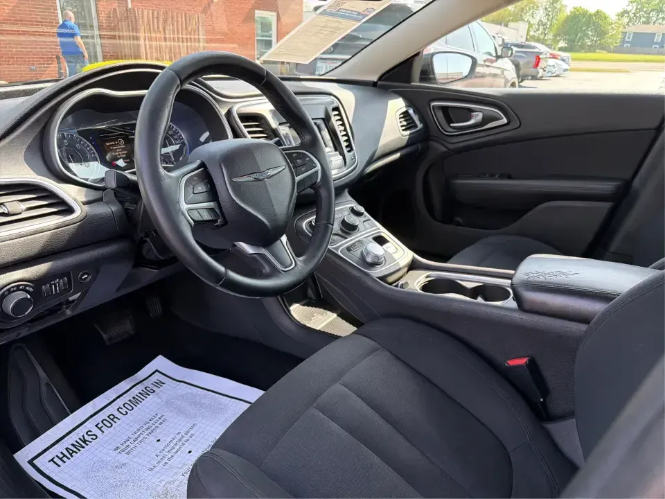 2015 Chrysler 200 Limited (1C3CCCAB6FN) with an 2.4L L4 DOHC 16V engine, 9-Speed Automatic transmission, located at 1099 N County Rd 25A, Troy, OH, 45373, (937) 908-9800, 40.057079, -84.212883 - Picture your next week: an easy I-75 commute, a comfortable run to Meijer, and a weekend cruise past the Miami County Fairgrounds-without stressing about how you'll get approved. This 2015 Chrysler 200 Limited is built for real life in Troy, Ohio: smooth, quiet, and efficient enough for daily drivin - Photo#9