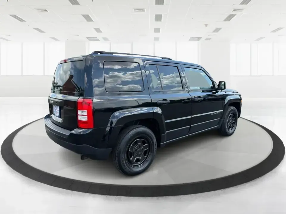 2014 Jeep Patriot Sport (1C4NJPBB0ED) with an 2.4L L4 DOHC 16V engine, located at 880 E. National Road, Vandalia, OH, 45377, (937) 908-9800, 39.891918, -84.183594 - Weekend getaways to the MetroParks, daily commutes down I75, or school-dropoff runs around Vandalia-this 2014 Jeep Patriot Sport is built for the kind of real-life driving that mixes practicality with a little adventure. Finished in Black Clearcoat with a versatile SUV body style, it's an easy fit f - Photo#2