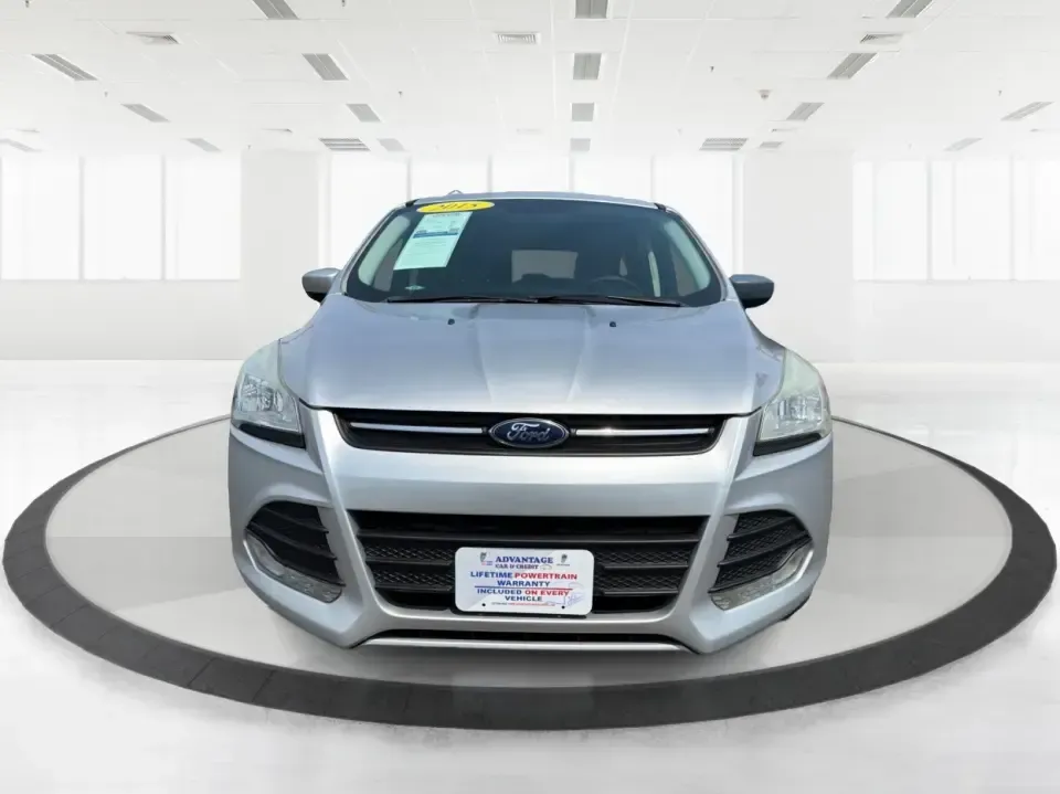 2015 Ford Escape SE (1FMCU9G98FU) with an 2.0L L4 DOHC 16V engine, 6-Speed Automatic transmission, located at 1099 N County Rd 25A, Troy, OH, 45373, (937) 908-9800, 40.057079, -84.212883 - Weekday commutes down I75, school drop-offs around Troy City Schools, and spontaneous weekend trips to Charleston Falls Preserve all get easier when you have an SUV that's the right size, the right power, and the right fit for your budget. This 2015 Ford Escape SE in Ingot Silver is built for real-l - Photo#7