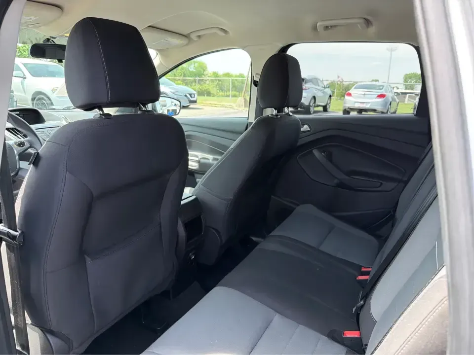 2015 Ford Escape SE (1FMCU9G98FU) with an 2.0L L4 DOHC 16V engine, 6-Speed Automatic transmission, located at 1099 N County Rd 25A, Troy, OH, 45373, (937) 908-9800, 40.057079, -84.212883 - Weekday commutes down I75, school drop-offs around Troy City Schools, and spontaneous weekend trips to Charleston Falls Preserve all get easier when you have an SUV that's the right size, the right power, and the right fit for your budget. This 2015 Ford Escape SE in Ingot Silver is built for real-l - Photo#10