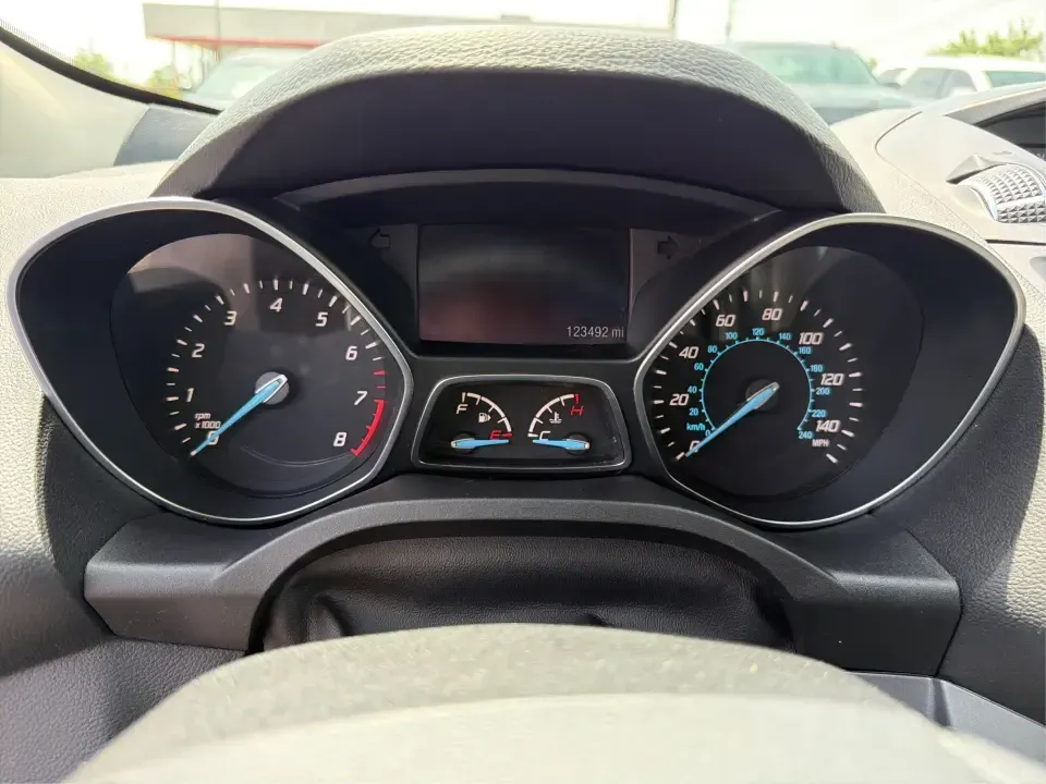 2015 Ford Escape SE (1FMCU9G98FU) with an 2.0L L4 DOHC 16V engine, 6-Speed Automatic transmission, located at 1099 N County Rd 25A, Troy, OH, 45373, (937) 908-9800, 40.057079, -84.212883 - Weekday commutes down I75, school drop-offs around Troy City Schools, and spontaneous weekend trips to Charleston Falls Preserve all get easier when you have an SUV that's the right size, the right power, and the right fit for your budget. This 2015 Ford Escape SE in Ingot Silver is built for real-l - Photo#15