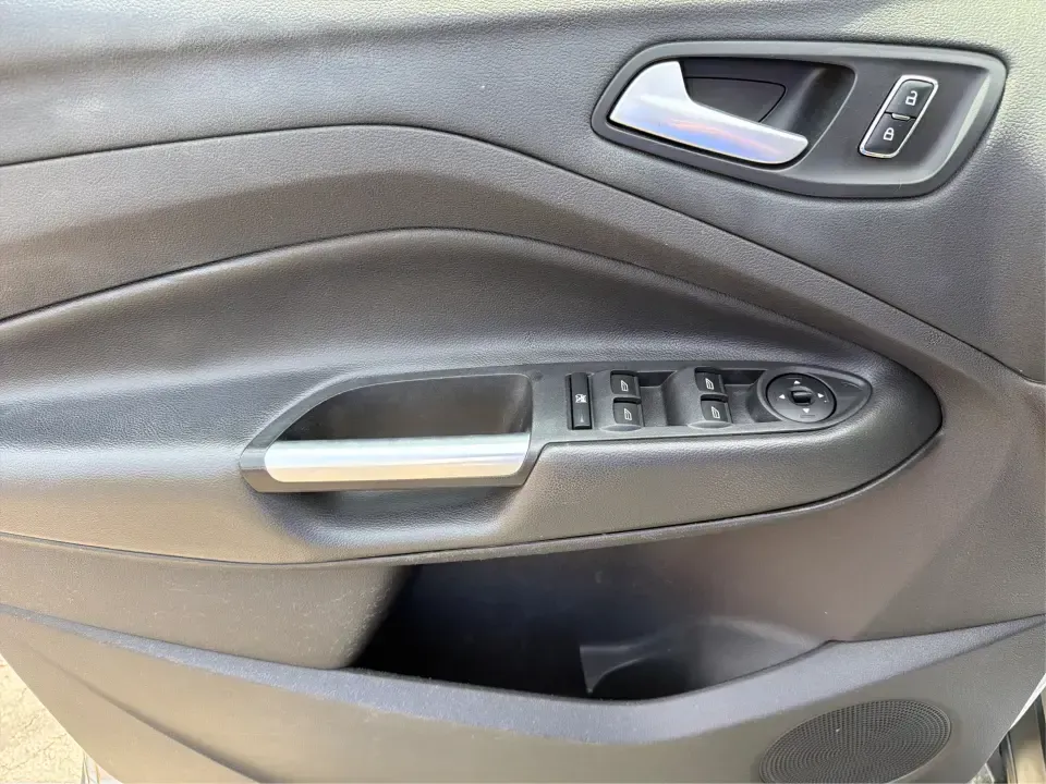 2015 Ford Escape SE (1FMCU9G98FU) with an 2.0L L4 DOHC 16V engine, 6-Speed Automatic transmission, located at 1099 N County Rd 25A, Troy, OH, 45373, (937) 908-9800, 40.057079, -84.212883 - Weekday commutes down I75, school drop-offs around Troy City Schools, and spontaneous weekend trips to Charleston Falls Preserve all get easier when you have an SUV that's the right size, the right power, and the right fit for your budget. This 2015 Ford Escape SE in Ingot Silver is built for real-l - Photo#19