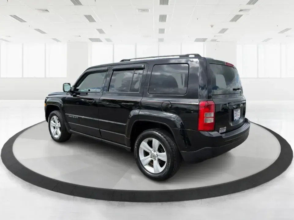 2014 Jeep Patriot Latitude 4WD (1C4NJRFB4ED) with an 2.4L L4 DOHC 16V engine, located at 1099 N County Rd 25A, Troy, OH, 45373, (937) 908-9800, 40.057079, -84.212883 - Weekend plans, winter commutes, school drop-offs, and last-minute road trips all get easier when you've got an SUV that fits real life. This **2014 Jeep Patriot Latitude 4WD** in **Black Clearcoat** is a practical choice for drivers who want confident traction, a comfortable cabin for five, and the- Photo#4