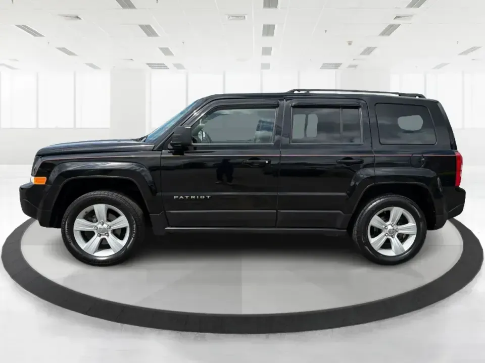 2014 Jeep Patriot Latitude 4WD (1C4NJRFB4ED) with an 2.4L L4 DOHC 16V engine, located at 1099 N County Rd 25A, Troy, OH, 45373, (937) 908-9800, 40.057079, -84.212883 - Weekend plans, winter commutes, school drop-offs, and last-minute road trips all get easier when you've got an SUV that fits real life. This **2014 Jeep Patriot Latitude 4WD** in **Black Clearcoat** is a practical choice for drivers who want confident traction, a comfortable cabin for five, and the- Photo#5