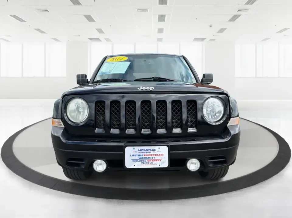 2014 Jeep Patriot Latitude 4WD (1C4NJRFB4ED) with an 2.4L L4 DOHC 16V engine, located at 1099 N County Rd 25A, Troy, OH, 45373, (937) 908-9800, 40.057079, -84.212883 - Weekend plans, winter commutes, school drop-offs, and last-minute road trips all get easier when you've got an SUV that fits real life. This **2014 Jeep Patriot Latitude 4WD** in **Black Clearcoat** is a practical choice for drivers who want confident traction, a comfortable cabin for five, and the- Photo#7