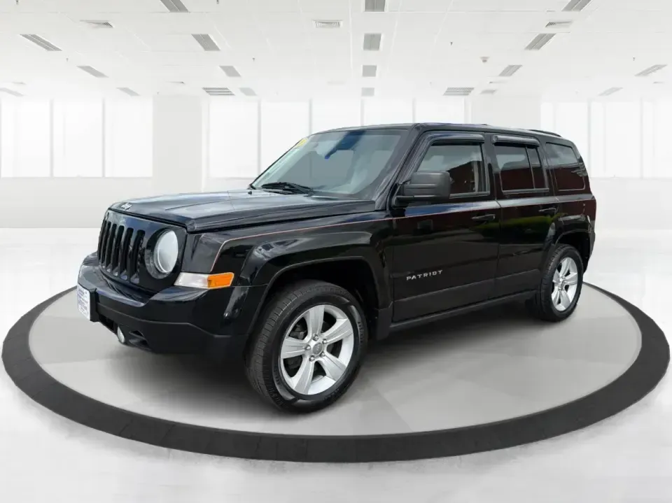 2014 Jeep Patriot Latitude 4WD (1C4NJRFB4ED) with an 2.4L L4 DOHC 16V engine, located at 1099 N County Rd 25A, Troy, OH, 45373, (937) 908-9800, 40.057079, -84.212883 - Weekend plans, winter commutes, school drop-offs, and last-minute road trips all get easier when you've got an SUV that fits real life. This **2014 Jeep Patriot Latitude 4WD** in **Black Clearcoat** is a practical choice for drivers who want confident traction, a comfortable cabin for five, and the- Photo#8