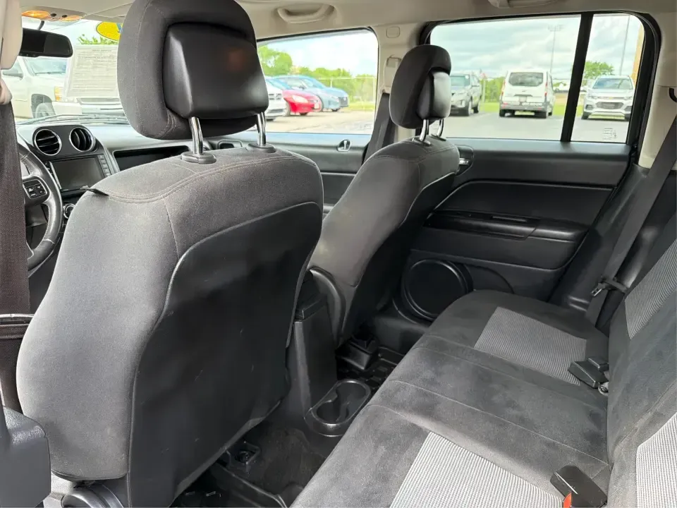 2014 Jeep Patriot Latitude 4WD (1C4NJRFB4ED) with an 2.4L L4 DOHC 16V engine, located at 1099 N County Rd 25A, Troy, OH, 45373, (937) 908-9800, 40.057079, -84.212883 - Weekend plans, winter commutes, school drop-offs, and last-minute road trips all get easier when you've got an SUV that fits real life. This **2014 Jeep Patriot Latitude 4WD** in **Black Clearcoat** is a practical choice for drivers who want confident traction, a comfortable cabin for five, and the- Photo#10