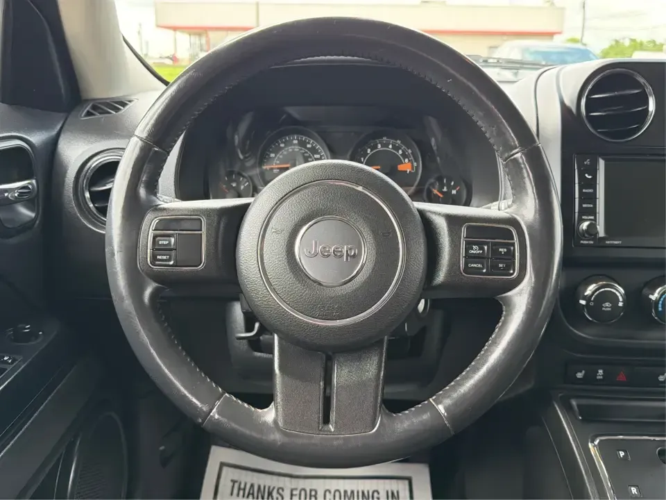 2014 Jeep Patriot Latitude 4WD (1C4NJRFB4ED) with an 2.4L L4 DOHC 16V engine, located at 1099 N County Rd 25A, Troy, OH, 45373, (937) 908-9800, 40.057079, -84.212883 - Weekend plans, winter commutes, school drop-offs, and last-minute road trips all get easier when you've got an SUV that fits real life. This **2014 Jeep Patriot Latitude 4WD** in **Black Clearcoat** is a practical choice for drivers who want confident traction, a comfortable cabin for five, and the- Photo#16