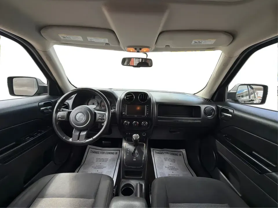 2014 Jeep Patriot Latitude 4WD (1C4NJRFB4ED) with an 2.4L L4 DOHC 16V engine, located at 1099 N County Rd 25A, Troy, OH, 45373, (937) 908-9800, 40.057079, -84.212883 - Weekend plans, winter commutes, school drop-offs, and last-minute road trips all get easier when you've got an SUV that fits real life. This **2014 Jeep Patriot Latitude 4WD** in **Black Clearcoat** is a practical choice for drivers who want confident traction, a comfortable cabin for five, and the- Photo#20