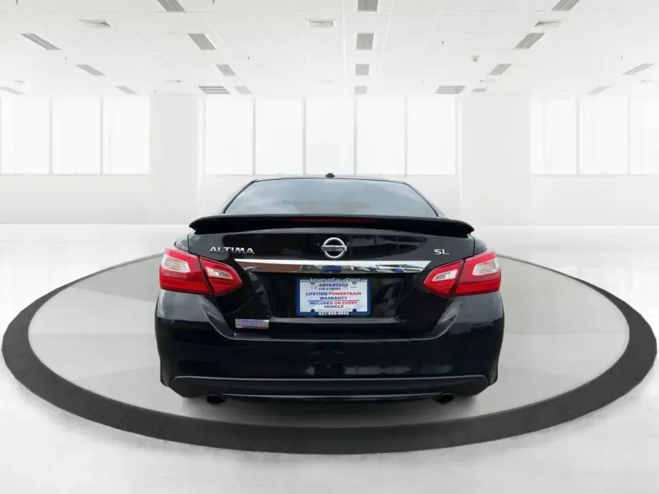 2016 Nissan Altima 2.5 SL (1N4AL3AP1GC) with an 2.5L I-4 DOHC engine, CVT transmission, located at 880 E. National Road, Vandalia, OH, 45377, (937) 908-9800, 39.891918, -84.183594 - Whether you're a Dayton-area commuter stacking highway miles, a busy parent shuttling kids between school and practice, or a weekend road-trip planner who wants comfort without overspending, this **2016 Nissan Altima 2.5 SL** is built for real life. With a sleek **Super Black** exterior and an upsca - Photo#3