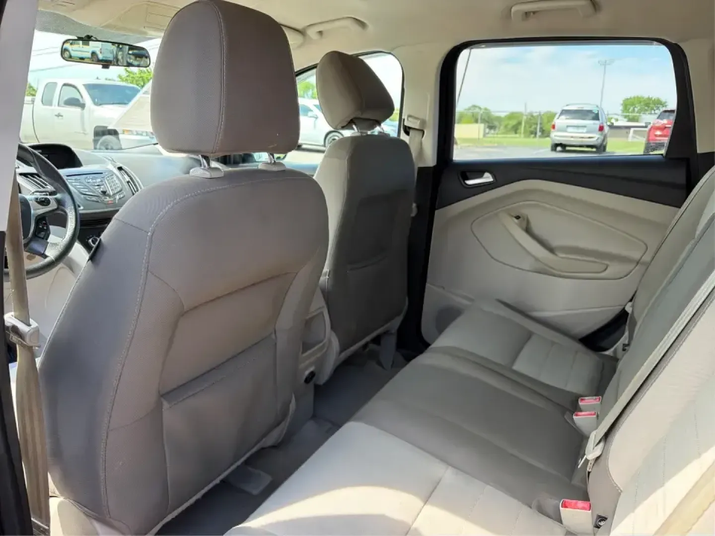 2014 Ford Escape SE (1FMCU9G9XEU) with an 2.0L L4 DOHC 16V engine, 6-Speed Automatic transmission, located at 4508 South Dixie Dr, Moraine, OH, 45439, (937) 908-9800, 39.689976, -84.218452 - Picture your next Ohio weekend: the kids loaded up for a day at Carillon Historical Park, a cooler in back for a picnic at Cox Arboretum, or a quick escape down I75 for a last-minute road trip-without worrying about whether your SUV can handle rain, slush, or a fully packed cargo area. This 2014 For - Photo#10
