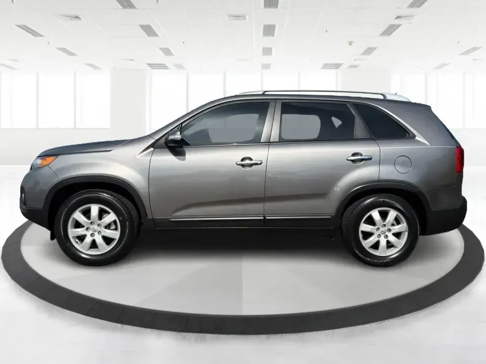 2012 Kia Sorento LX (5XYKT3A64CG) with an 2.4L I-4 gasoline direct injection engine, 6-Speed Automatic transmission, located at 401 Woodman Dr, Riverside, OH, 45431, (937) 908-9800, 39.760899, -84.123421 - Picture your next week going smoother: school drop-offs, the daily commute, grocery runs, and a last-minute weekend road trip-all in one comfortable SUV that fits real life without feeling like a compromise. This 2012 Kia Sorento LX in Satin Metal is the kind of practical, do-it-all sport utility th - Photo#5