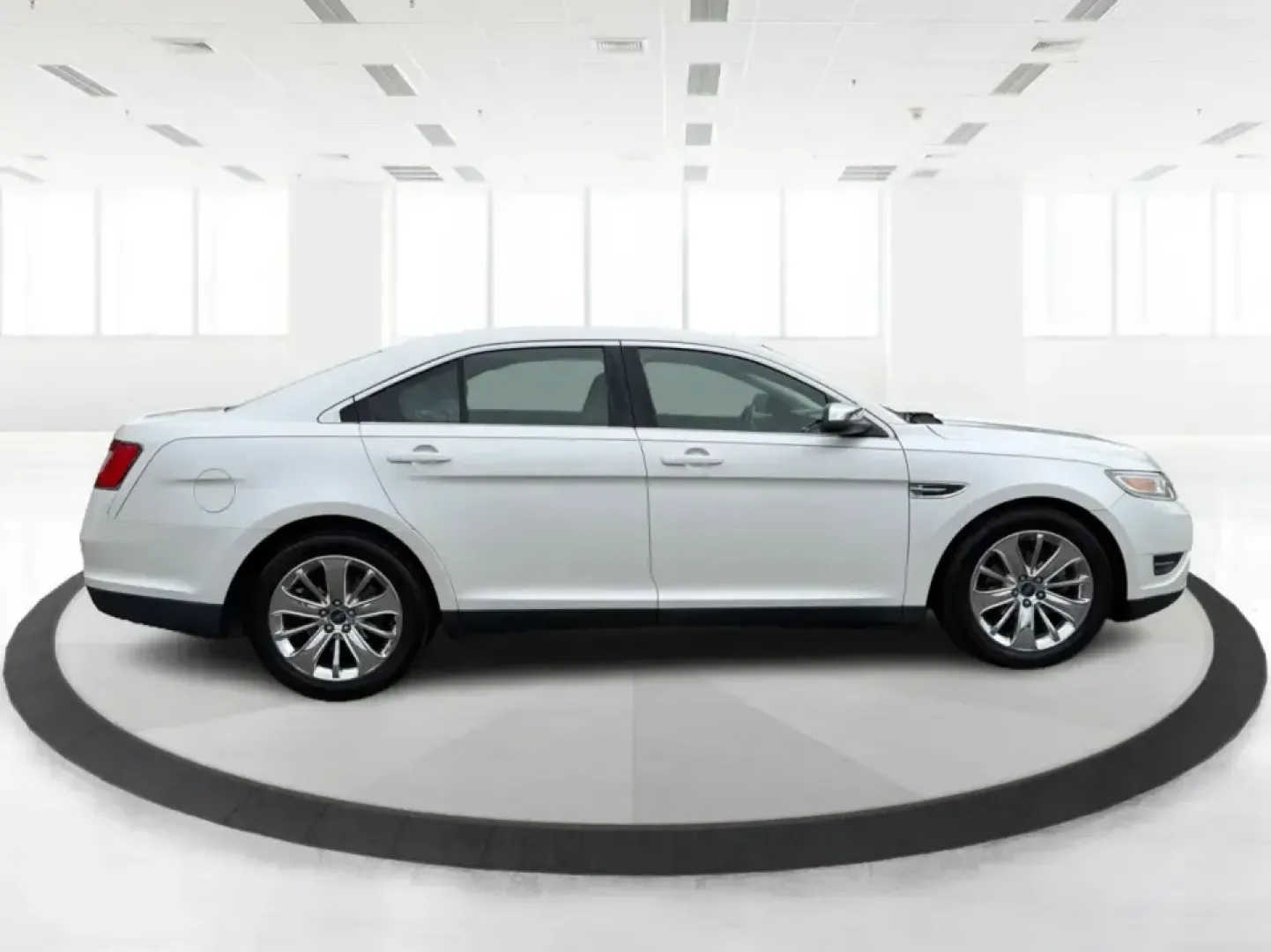 2012 Ford Taurus Limited (1FAHP2FW7CG) with an Duratec 3.5L V-6 DOHC engine, 6-Speed Automatic transmission, located at 401 Woodman Dr, Riverside, OH, 45431, (937) 908-9800, 39.760899, -84.123421 - Need a comfortable, confidence-inspiring sedan for long commutes down I-675, quick errands near The Greene, or smooth weekend drives to Downtown Dayton? This 2012 Ford Taurus Limited is built for real life-quiet, spacious, and loaded with premium features that make every mile feel easier, whether yo - Photo#1