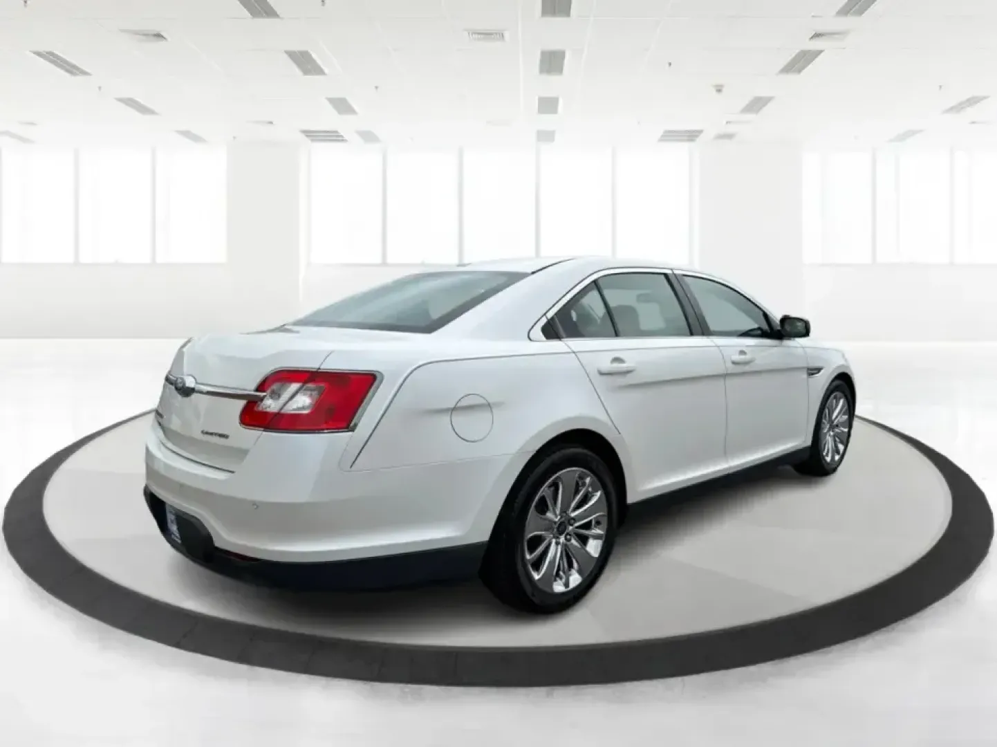 2012 Ford Taurus Limited (1FAHP2FW7CG) with an Duratec 3.5L V-6 DOHC engine, 6-Speed Automatic transmission, located at 401 Woodman Dr, Riverside, OH, 45431, (937) 908-9800, 39.760899, -84.123421 - Need a comfortable, confidence-inspiring sedan for long commutes down I-675, quick errands near The Greene, or smooth weekend drives to Downtown Dayton? This 2012 Ford Taurus Limited is built for real life-quiet, spacious, and loaded with premium features that make every mile feel easier, whether yo - Photo#2