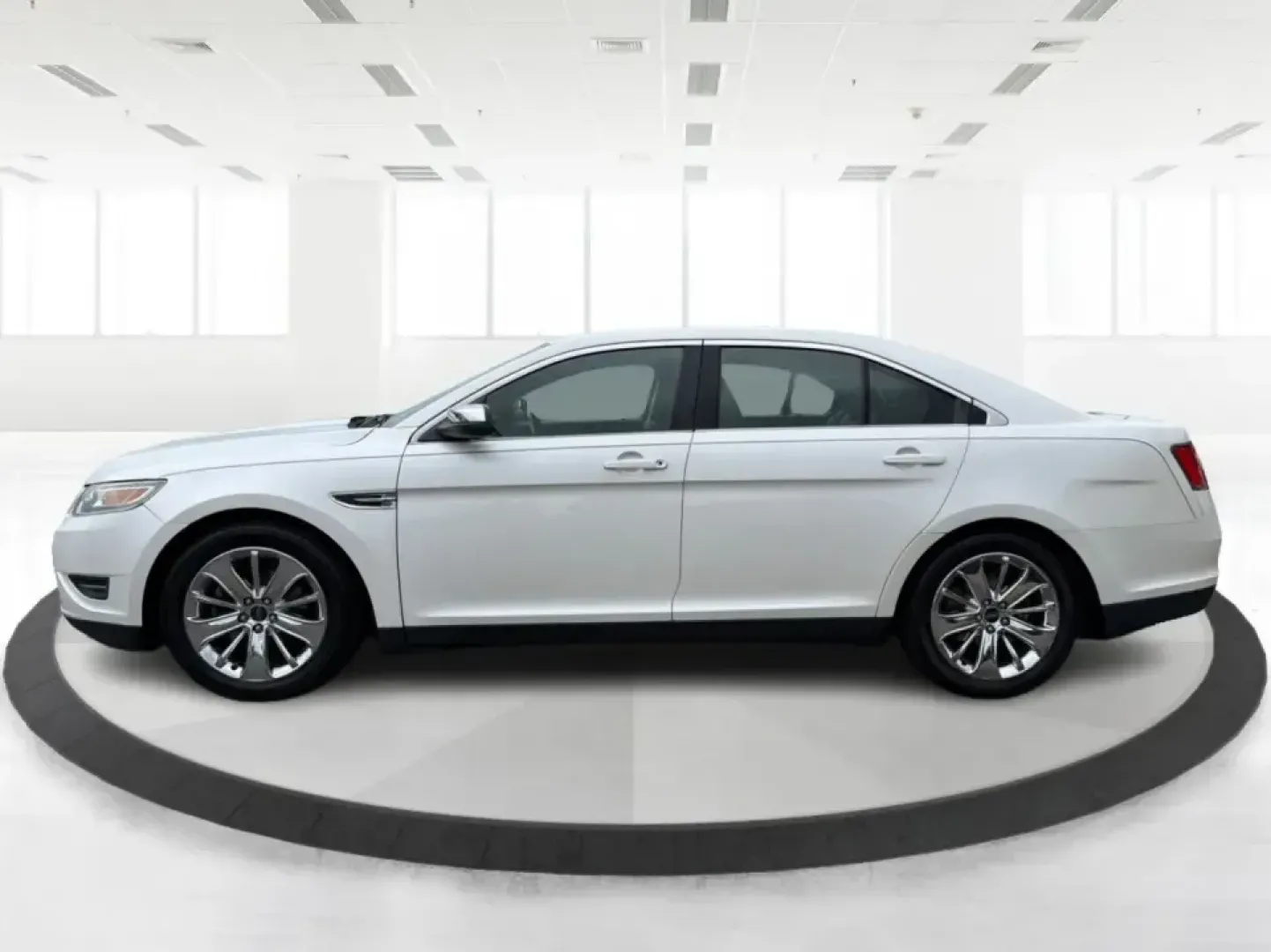 2012 Ford Taurus Limited (1FAHP2FW7CG) with an Duratec 3.5L V-6 DOHC engine, 6-Speed Automatic transmission, located at 401 Woodman Dr, Riverside, OH, 45431, (937) 908-9800, 39.760899, -84.123421 - Need a comfortable, confidence-inspiring sedan for long commutes down I-675, quick errands near The Greene, or smooth weekend drives to Downtown Dayton? This 2012 Ford Taurus Limited is built for real life-quiet, spacious, and loaded with premium features that make every mile feel easier, whether yo - Photo#5