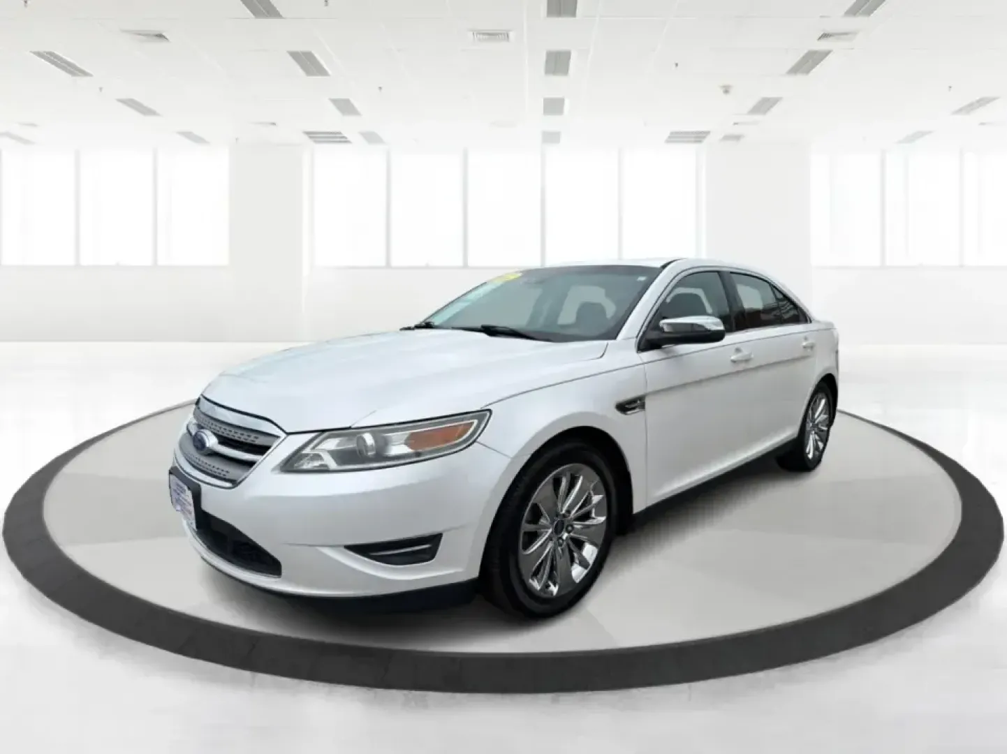 2012 Ford Taurus Limited (1FAHP2FW7CG) with an Duratec 3.5L V-6 DOHC engine, 6-Speed Automatic transmission, located at 401 Woodman Dr, Riverside, OH, 45431, (937) 908-9800, 39.760899, -84.123421 - Need a comfortable, confidence-inspiring sedan for long commutes down I-675, quick errands near The Greene, or smooth weekend drives to Downtown Dayton? This 2012 Ford Taurus Limited is built for real life-quiet, spacious, and loaded with premium features that make every mile feel easier, whether yo - Photo#8