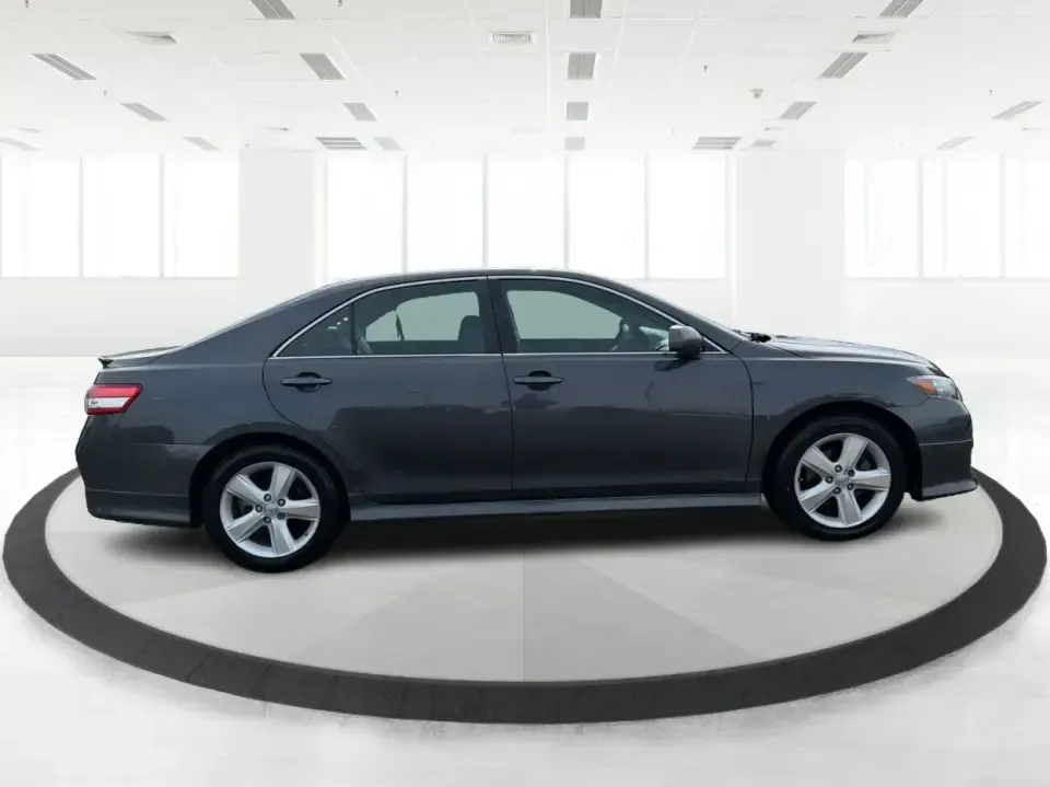2011 Toyota Camry SE V6 (4T1BK3EK9BU) with an 3.5L V-6 DOHC engine, 6-Speed Automatic transmission, located at 4508 South Dixie Dr, Moraine, OH, 45439, (937) 908-9800, 39.689976, -84.218452 - Need a commuter that can eat up I75 miles all week, then still feel sporty for a Saturday drive past the Great Miami River or out toward the Miami Valley? This 2011 Toyota Camry SE V6 is the kind of practical-yet-fun sedan that fits real life in Piqua-reliable for work runs, comfortable for family e - Photo#1